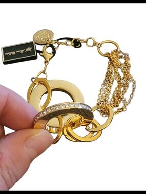 Gold Tone Interlocking Circle Bracelet with Crystal Accent